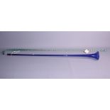 A reeded glass coaching horn, 39" long, and a twisted green glass walking stick, 48" long