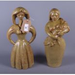 A Fulham pottery figure of a mother and child, by Eric Griffiths, and a companion figure of a woman,