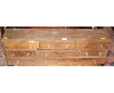 A wooden tool chest, fitted eight drawers and assorted tools, etc