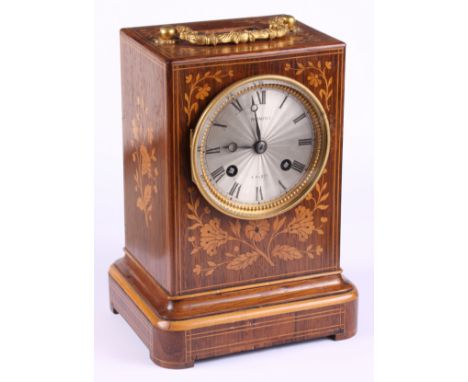 A late 19th century French mantel clock, in floral marquetry decorated case, engine turned silver dial inscribed Promoli Pari