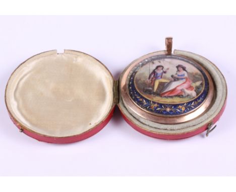 A 19th century miniature enamel on copper shepherdess and lover, in gilt metal frame and fitted morocco leather case