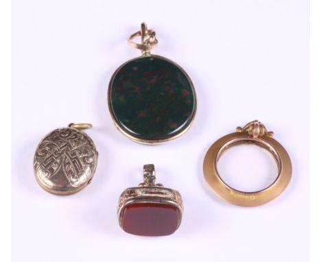 A 15ct gold locket, a gold mounted fob seal, a front and back gold locket with enamel decoration and a gold mounted bloodston