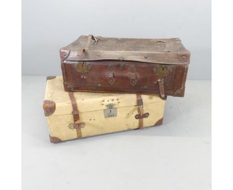 Two vintage leather trunks. Brown leather dimensions 90x34x52cm. 
