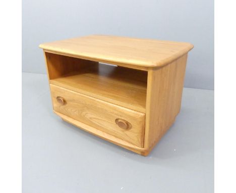 ERCOL - A Windsor model 1130 corner drop-leaf TV cabinet, with single drawer and maker's button. 73x49x52cm (opening to 81cm)