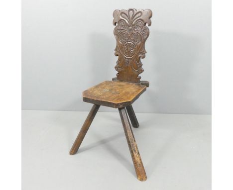 An 18th century Italian Sgabello tripod hall chair. 