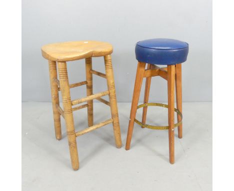 A vintage elm seated stool on turned legs, height 73cm, and another mid-century teak and faux leather upholstered stool, heig