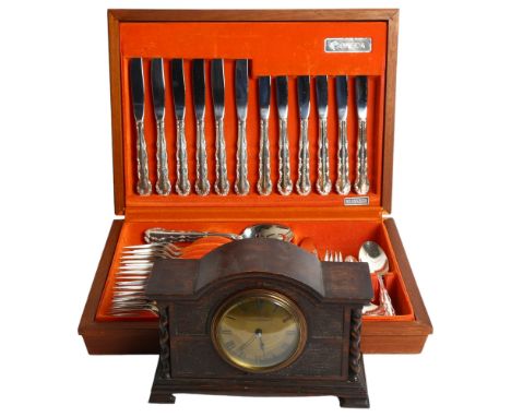 A Oneida silver plate canteen of cutlery, in wooden display case, and an oak 8-day movement Mappin & Webb Ltd mantel clock 