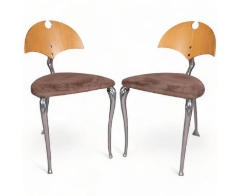 A pair of vintage dining chairs, with Aluminium frame and bent plywood backs, beige faux suede upholstery, height 77.5 Damage