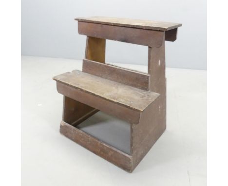 A Japanese stained kiri wood step stool, with three character marks to inside. 54x65x43cm. 