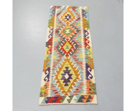 A Chobi Kilim runner. 160x62cm. 