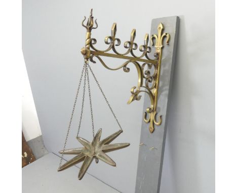 A vintage brass hanging bracket. Bracket dimensions 48x57cm. 
