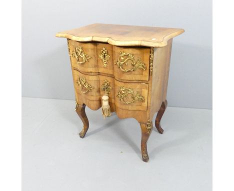 A 19th century style French crossbanded walnut commode chest of two drawers, with ormolu mounts and cabriole legs. 63x73x43cm