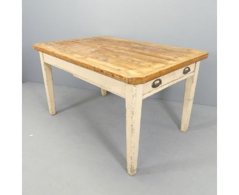 A vintage pine scrub-top farmhouse kitchen table on painted base, with end frieze drawer and square tapered legs. 136x76x90cm