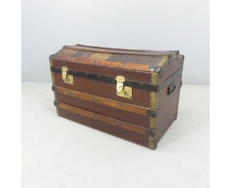 An antique brass bound dome top trunk, with tray fitted interior. 72x46x42cm. 