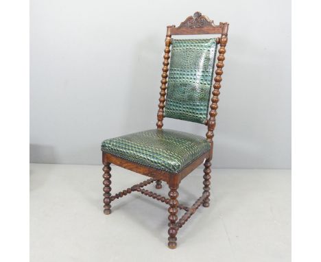 An antique simulated rosewood and faux crocodile leather upholstered hall chair, with bobbin-turned supports. 