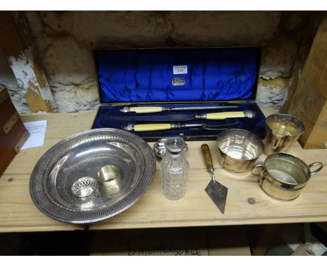 A three piece bone handled Carving Set in case, plated circular Dish, Table Lighter and other items.