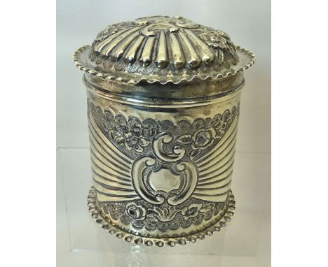 A Victorian silver cylindrical Tea Caddy with domed cover, embossed decoration, London, 1894, makers mark 'J N', retailed by 