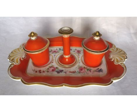 A Continental porcelain Inkstand, the oblong tray of serpentine outline, painted with flowers and with a gilt shell moulded b
