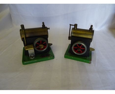 A small Stationary Engine by the Signal Engineering Company Limited.  4" (10cms) wide and another similar. 