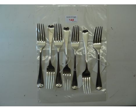 Four George III silver old English pattern Table Forks, London 1813, maker: Eley, Fearn & Chawner; a pair of Forks, London 18