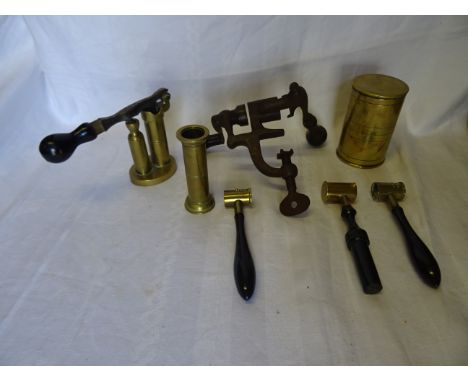 A number of brass Cartridge Filling Tools with turned wooden handles, etc.
