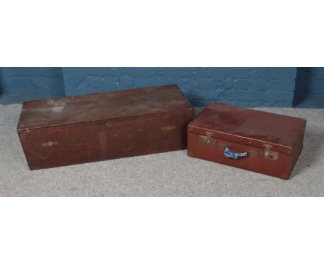 A long wooden lockable trunk along with leather suitcase. Trunk approx. 1m wide.  