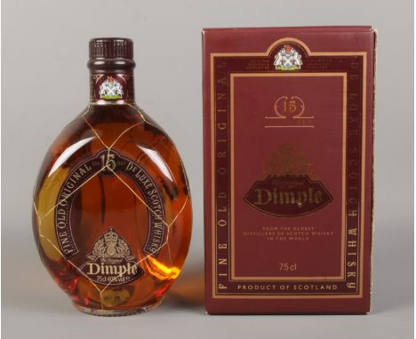 A boxed and sealed bottle of Dimple 15 years old De Luxe Scotch Whisky (75cl).  