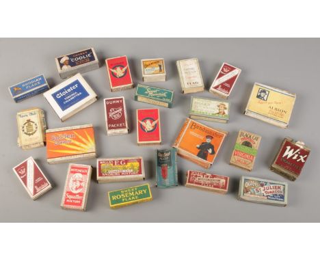 A collection of vintage dummy tobacco and cigarette packets.  