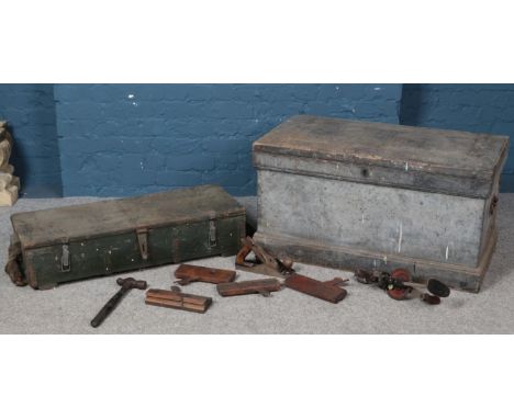 An engineers chest with contents of tools along with a vintage ammo crate.  