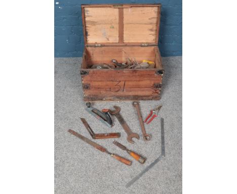 A pine tool chest complete with an assortment of vintage tools, include files, spanners etc.  