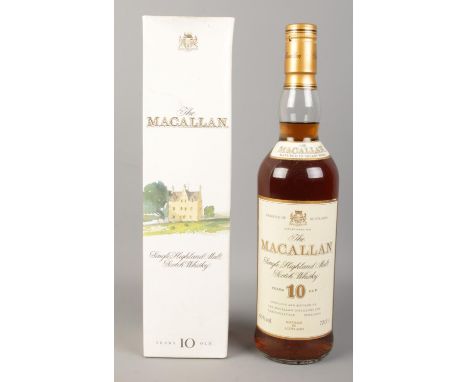 The Macallan; A full, boxed and sealed bottle of 10 years old Single Highland Malt Scotch Whisky. 70cl.  Some slight marks to