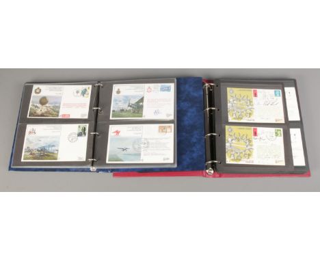 Two albums containing a selection of limited edition RAF/GB first day covers, with many RAF covers signed (approximately 115)