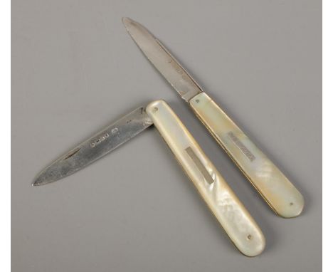 Two Victorian silver bladed and mother of pearl folding fruit knives, one with bar insert inscribed 'M. Rawlin'. Both assayed