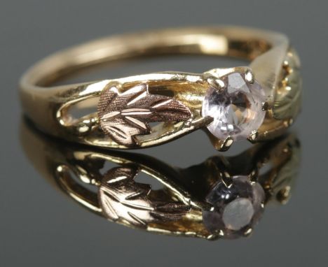 A Black Hills gold American ring by Sturgis, South Dakota, stamped 10k to the inside of the band. Total weight: 2.78g  