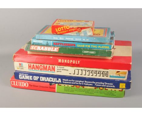 A quantity of vintage board games including Monoply, Game of Dracula, Cluedo and Scrabble.  