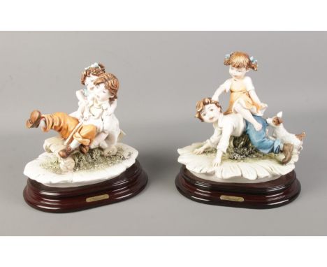 Two Capodimonte style figures by Berger depicting two children playing.  