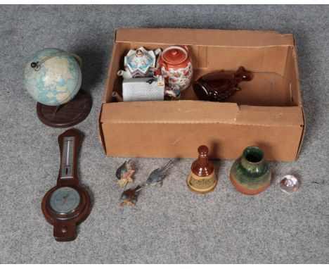 A box of miscellaneous to include banjo barometer, Beswick birds, tin globe and novelty Coronation St. teapot.  