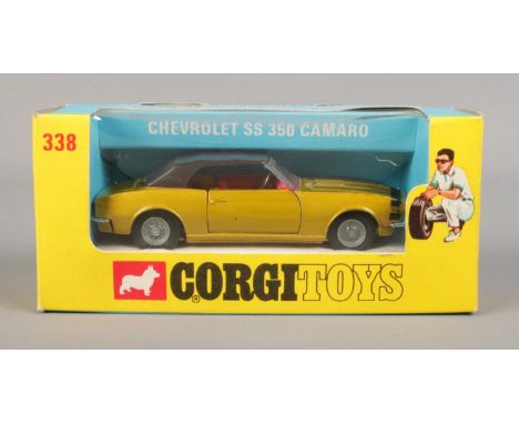 Corgi - No. 338; A boxed Chevrolet SS 350 Camaro die-cast model, with red interior and leaflet.  Some minor dents to the plas