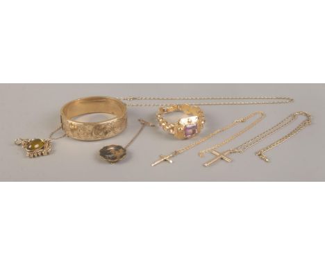 A collection of Gold Plated items to include rolled gold bangle, 9ct Gold crucifix on chain and an Oriental lacquered brooch.
