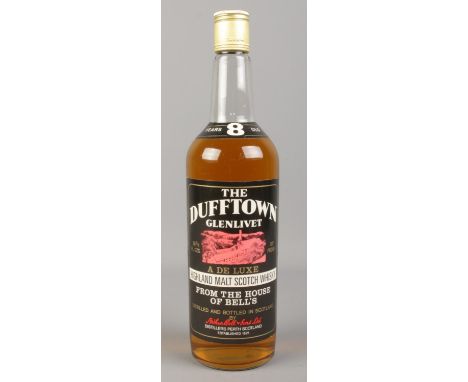 A sealed bottle of 8 Years Old The Dufftown Glenlivet Highland Malt Scotch Whisky (26 2/3 fl.ozs).  