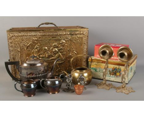 A good collection of metalwares, to include brass bound two section canterbury, pewter figures, brass wall mounted candlestic
