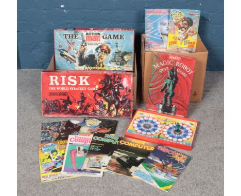 A collection of vintage board games and computer magazines. To include Risk and The Magic Robot.  