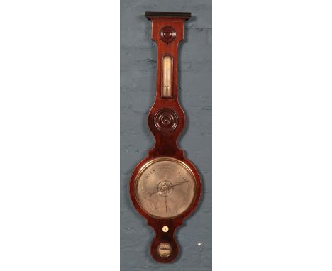 A Victorian mahogany banjo barometer by J Predary.  