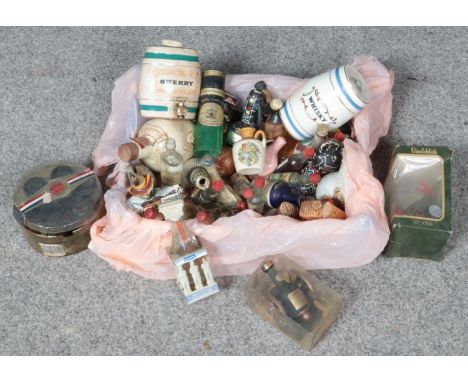 A box of alcohol miniatures. Includes decorative examples, Wade, boxed examples etc.  