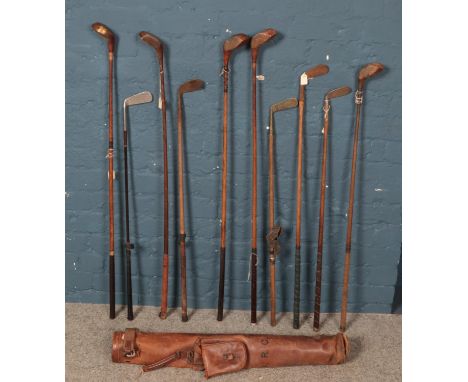 A quantity of vintage golf clubs. Including W.Smithson Leyland putter, Macgregor, Pyramid putter,  
