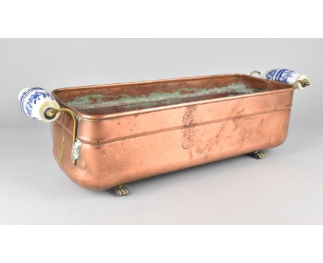 A Copper Rectangular Planter with Blue and White Ceramic Handles, 52cms Wide 