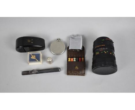 A Collection of Various Sundries to Include Strathcona Auto 1:2.8, 135mm Telescopic Lense, Pocket Lighter, Camera Shutter Cal
