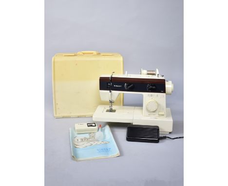 A Vintage Cased Electronic Singer 5528 Sewing Machine with Power Cable, Foot Pedal and Instructions, Untested 