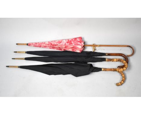A Collection of Three Vintage Umbrellas with 9ct Gold and Yellow Metal Bands and a Parasol 