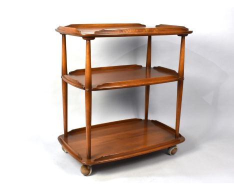 A 1970s Ercol Model 458 Three Tier Elm and Beech Tea Trolley Designed by Lucian Ercolani, 70cms Wide 